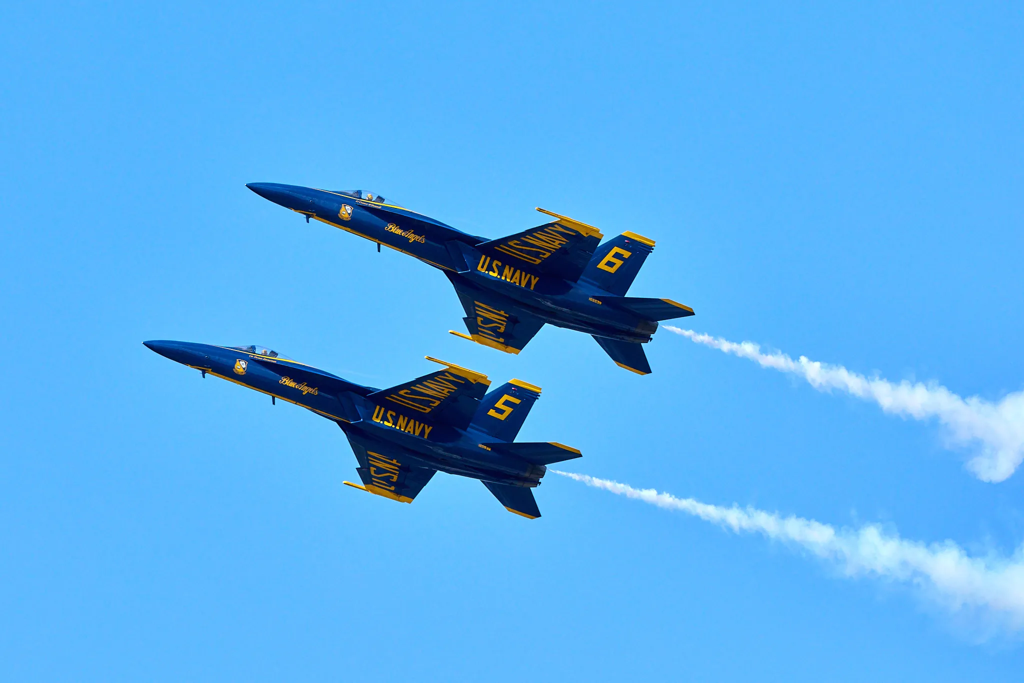 US Navy Blue Angels solo pilots on a gentle parade pass